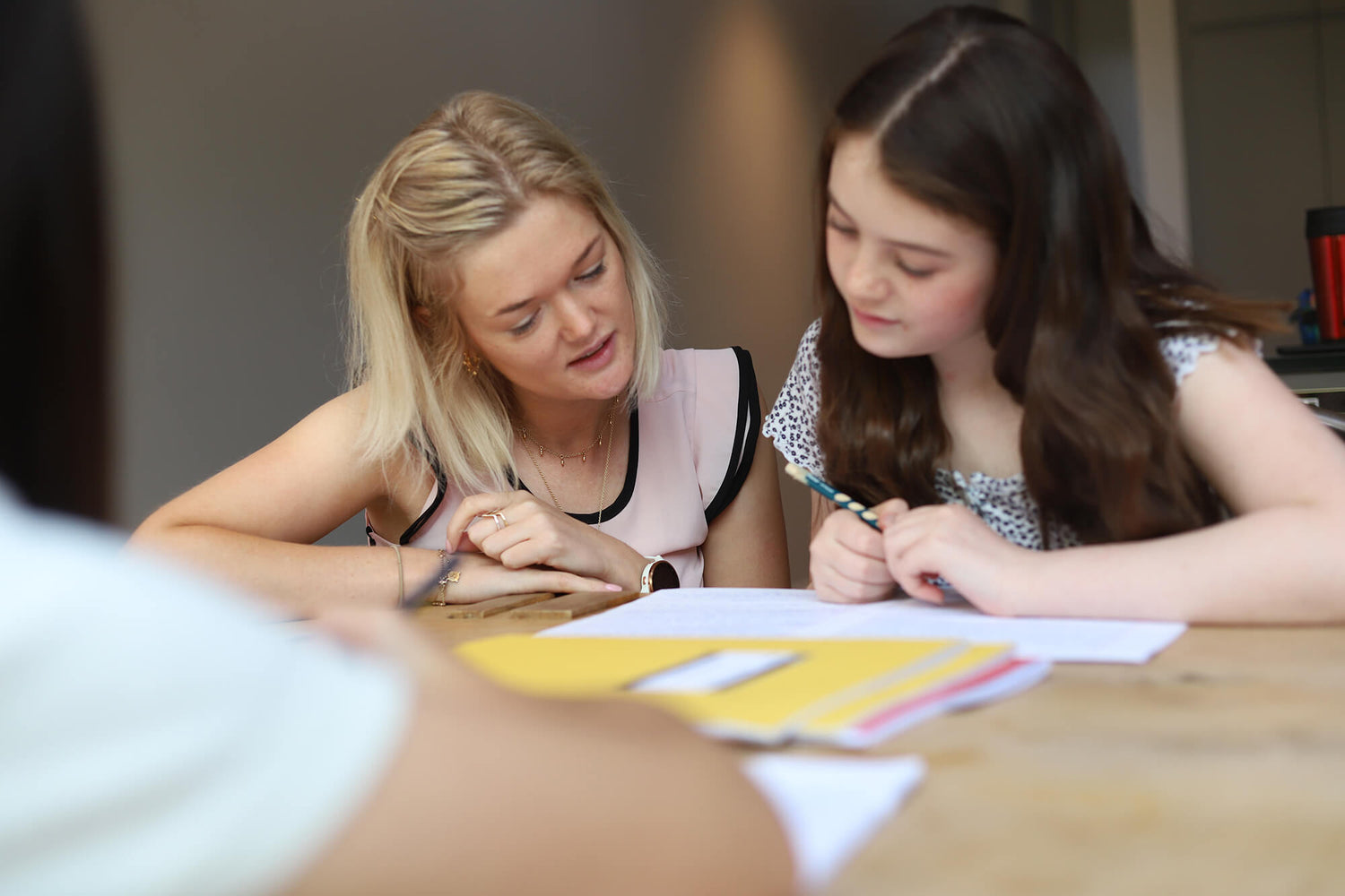 Phoebe reading with a female student